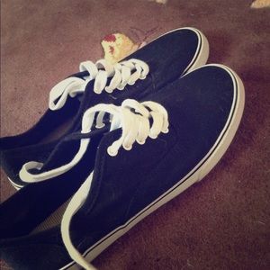 Black and white flat sneakers